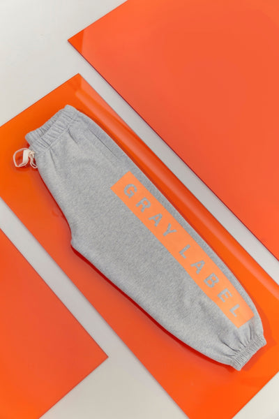 Logo Track Pants | Gray Melange - Bright Melon