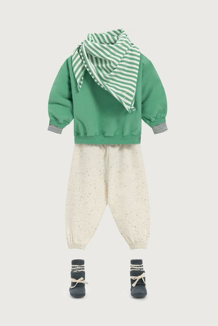 Outfit for a baby with green, cream and blue-grey colors