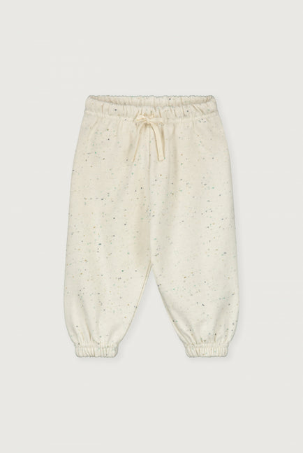 Cream with colored dots jogger with an elastic band for a baby