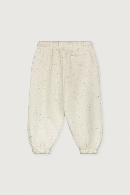 Cream with colored dots jogger with an elastic band for a baby