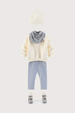 Outfit for a baby in cream, blue and grey