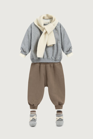 Outfit for a baby with grey, cream and brown colors