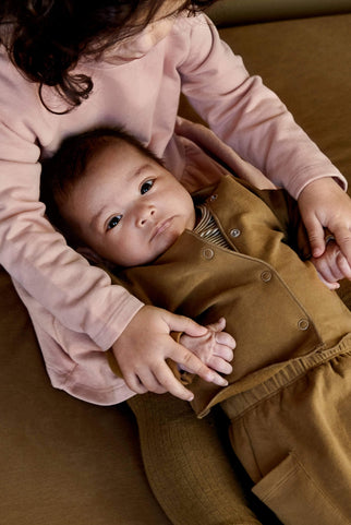 Baby jacket with buttons in a pink color
