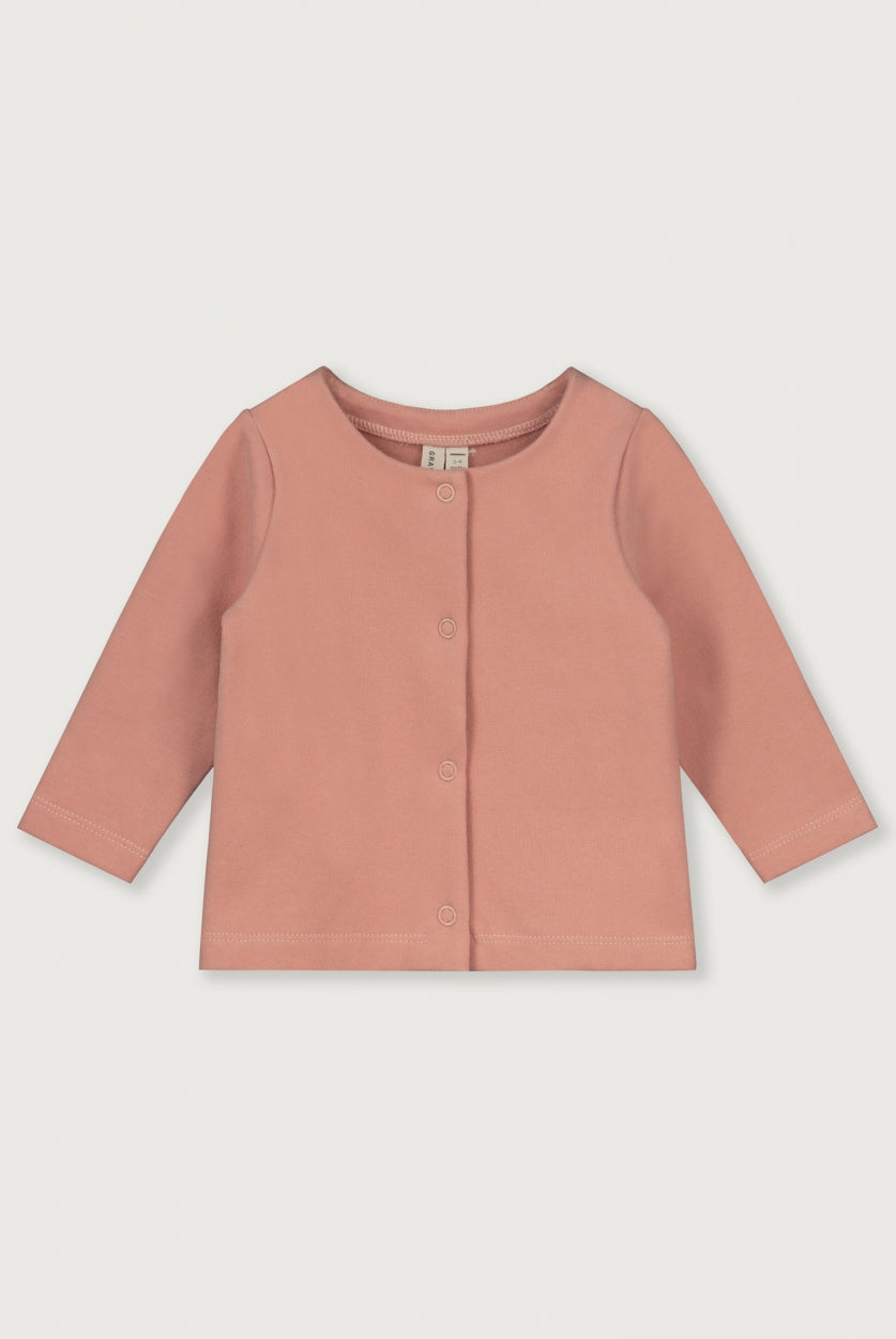 Baby jacket with buttons in a pink color