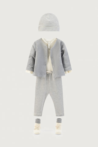 A outfit for a baby in grey and cream colors